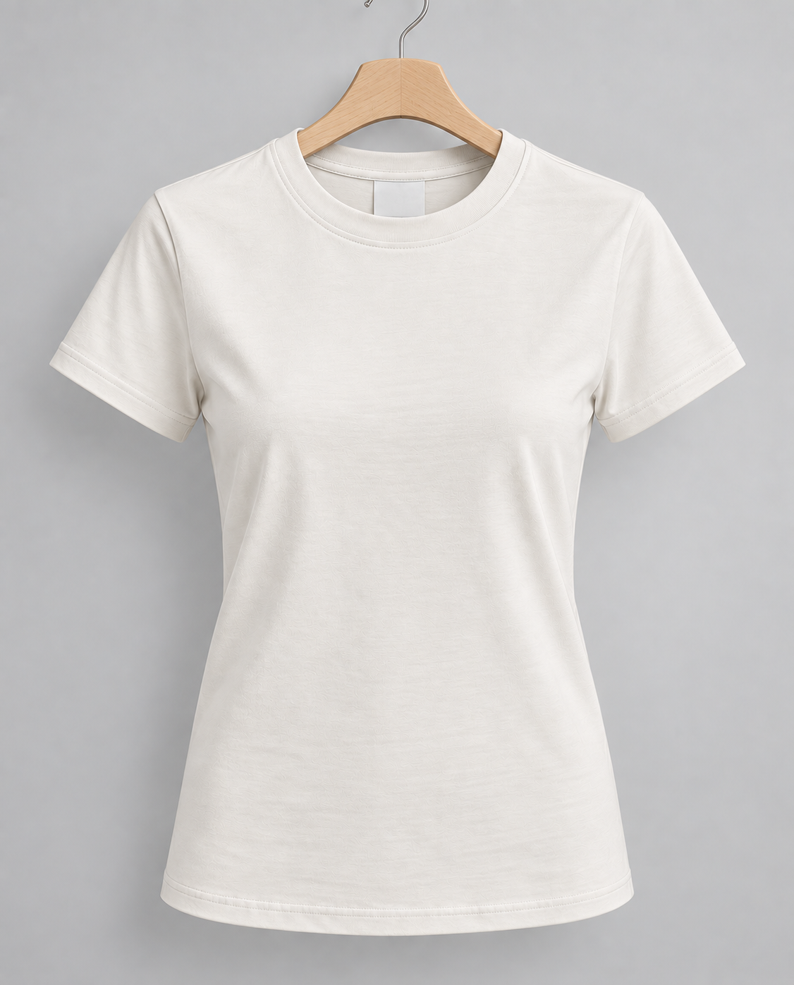 Basic ivory cotton T-shirt with a classic crew neck and short sleeves.