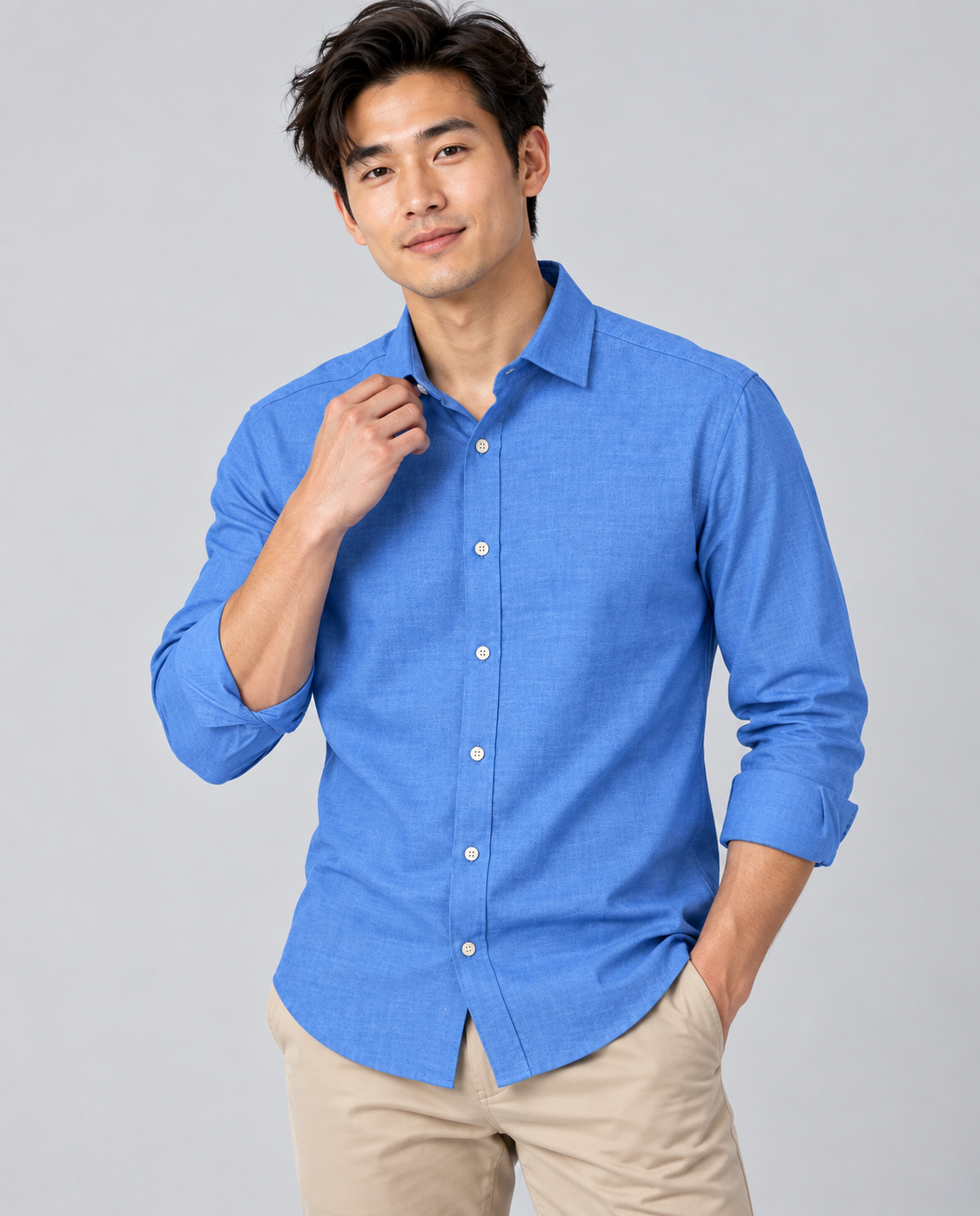 Blue cotton men’s shirt featuring a classic check pattern and comfortable casual fit.