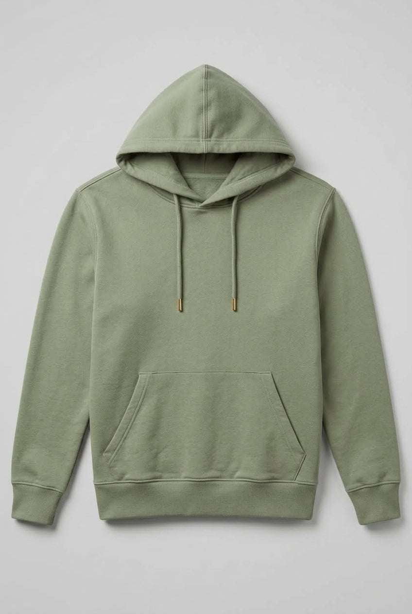 A sage green pullover hoodie with matching drawstrings and small gold-toned tips, displayed flat against a light gray background.