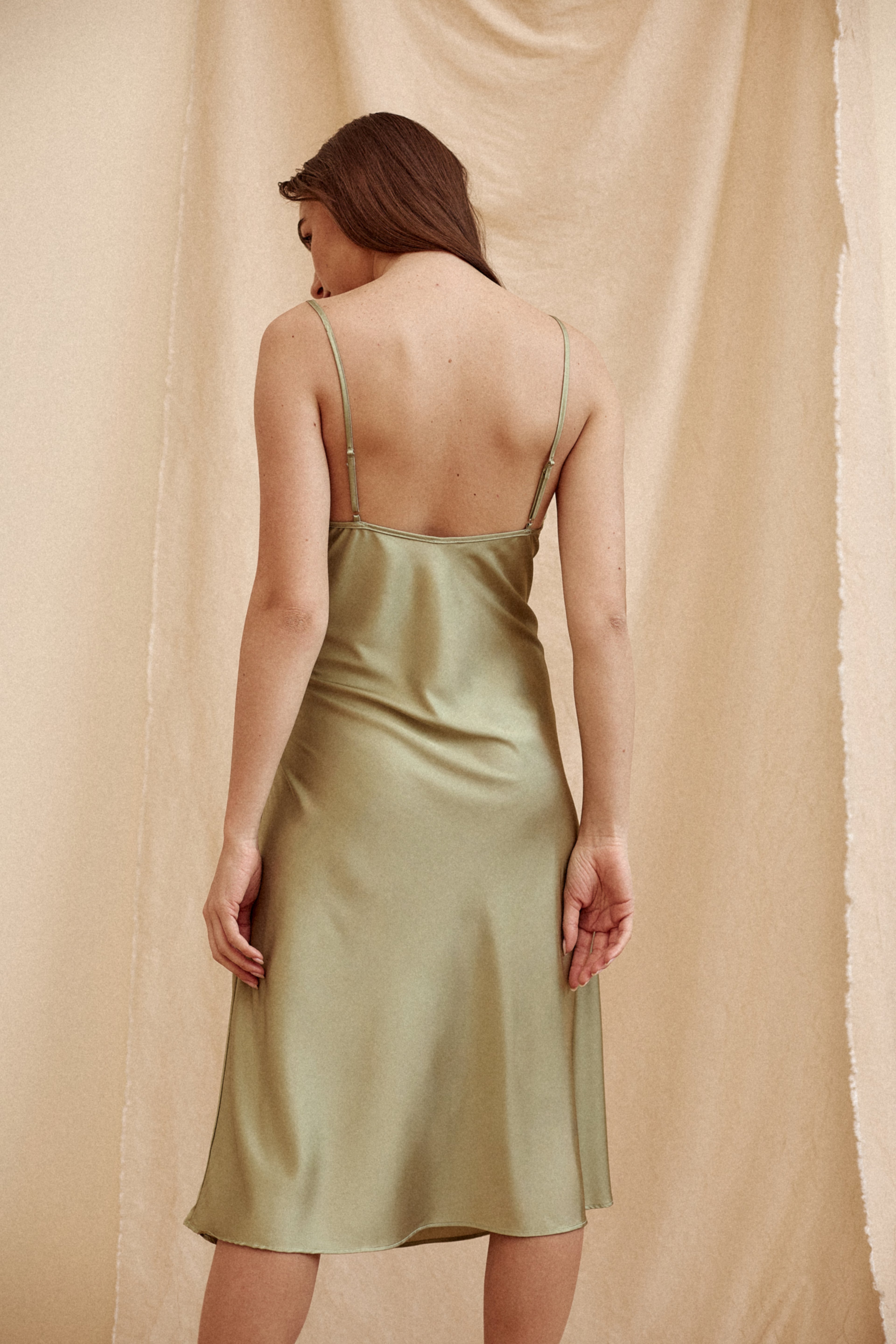 Woman wearing a dress Silk sateen dress 