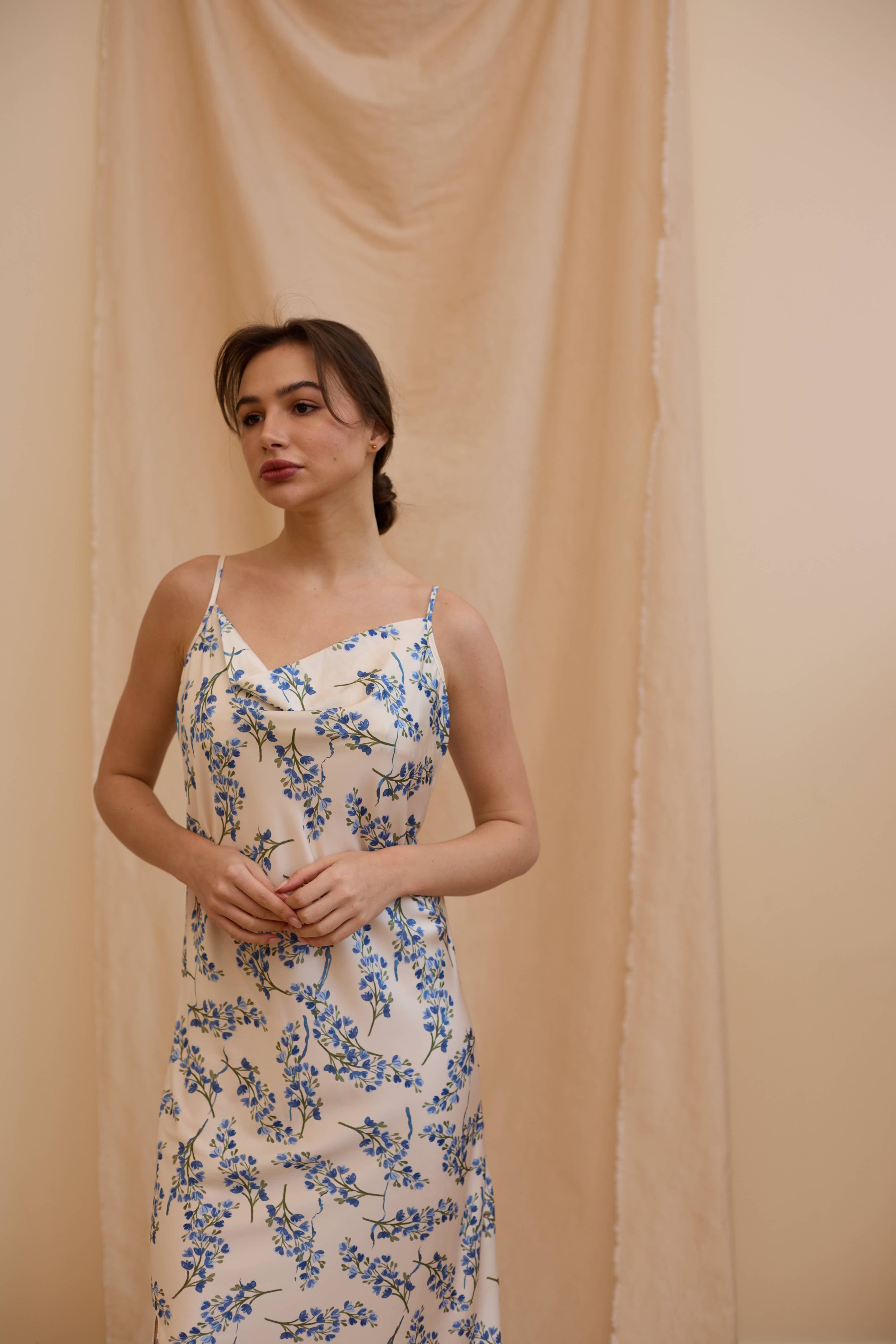 Woman wearing a floral dress Silk sateen dress 